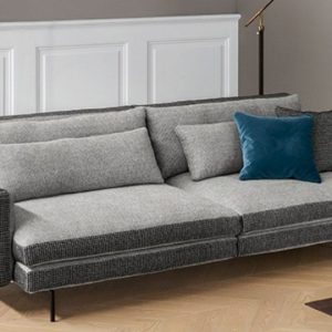 Divano Bonaldo modello Colors, divano componibile con una fascia di tessuto che scorre su tutto il perimetro di seduta, scocca e braccioli.